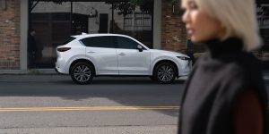 white 2024 mazda cx5 parked on the street